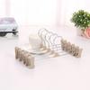 Retractable Stainless Steel Non-slip Hanger with Adjustable Clips for Trousers, Skirts, Underwear, and Socks.