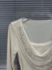 Camiseta de Manga Murciélago con Pedrería Otoño/Invierno 2025: Elegante Top Ajustado para Mujer