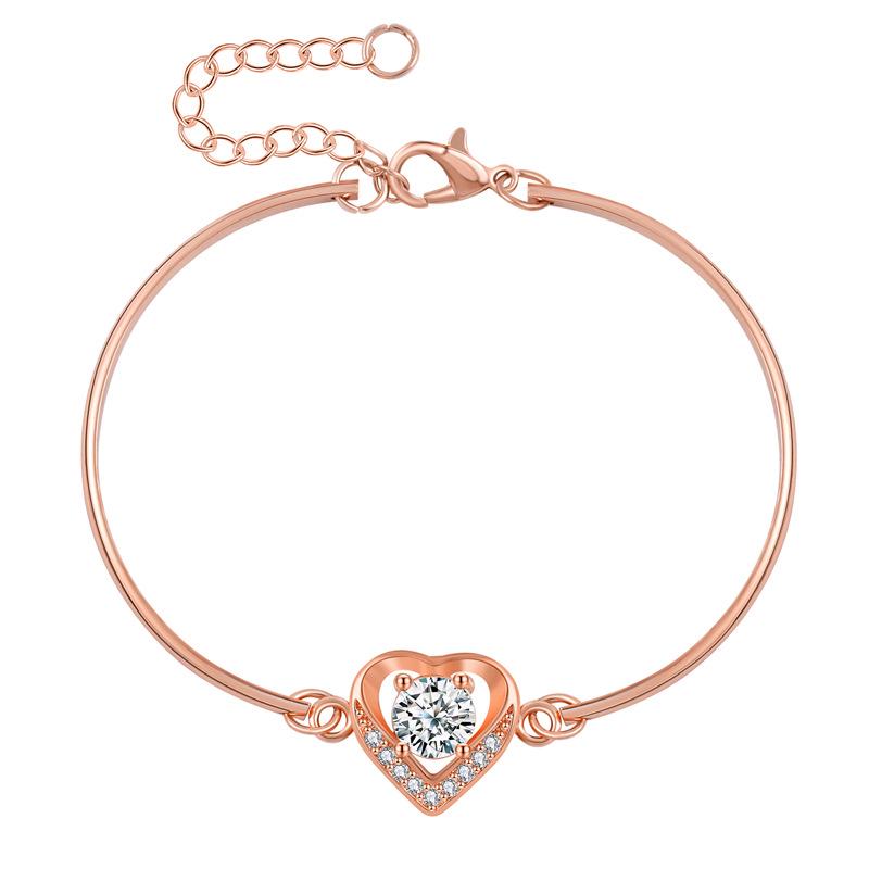 Europäischer und Amerikanischer Stil Vergoldetes Pfirsichherz Schmuckset: Kupfer-Mikro-Inlay Zirkon Ohrringe, Halskette und Ring.