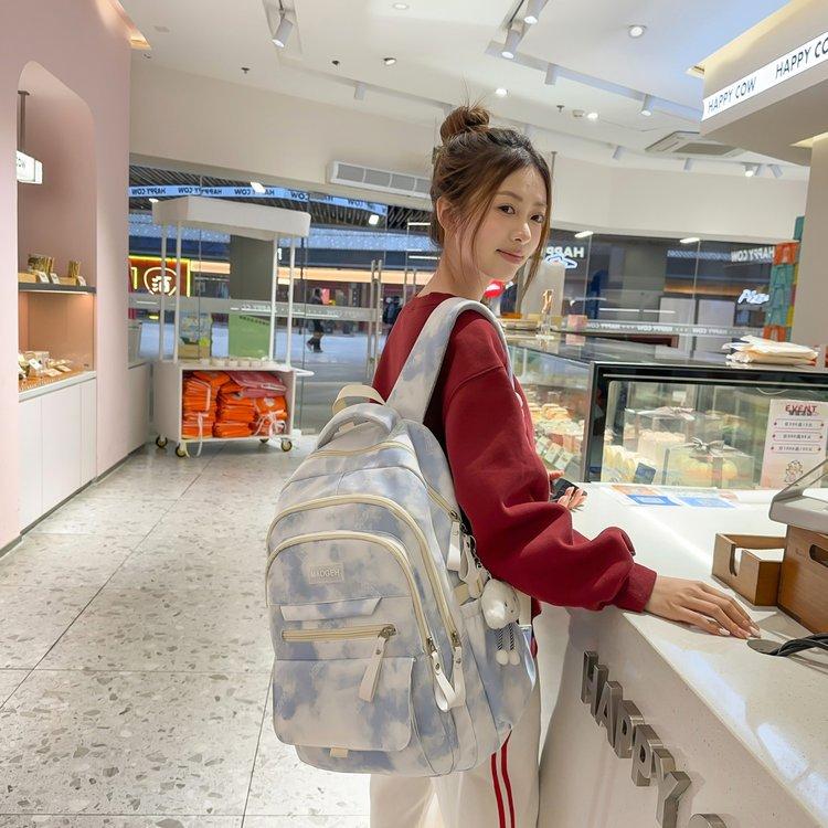 Schoolbag female simple new large-capacity student backpack junior high school students niche high value leisure travel backpack