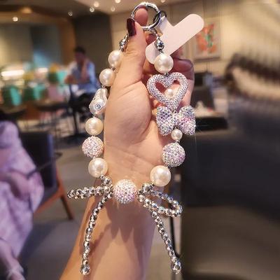 Accesorii pentru telefoane – Curele și brelocuri pentru telefoane