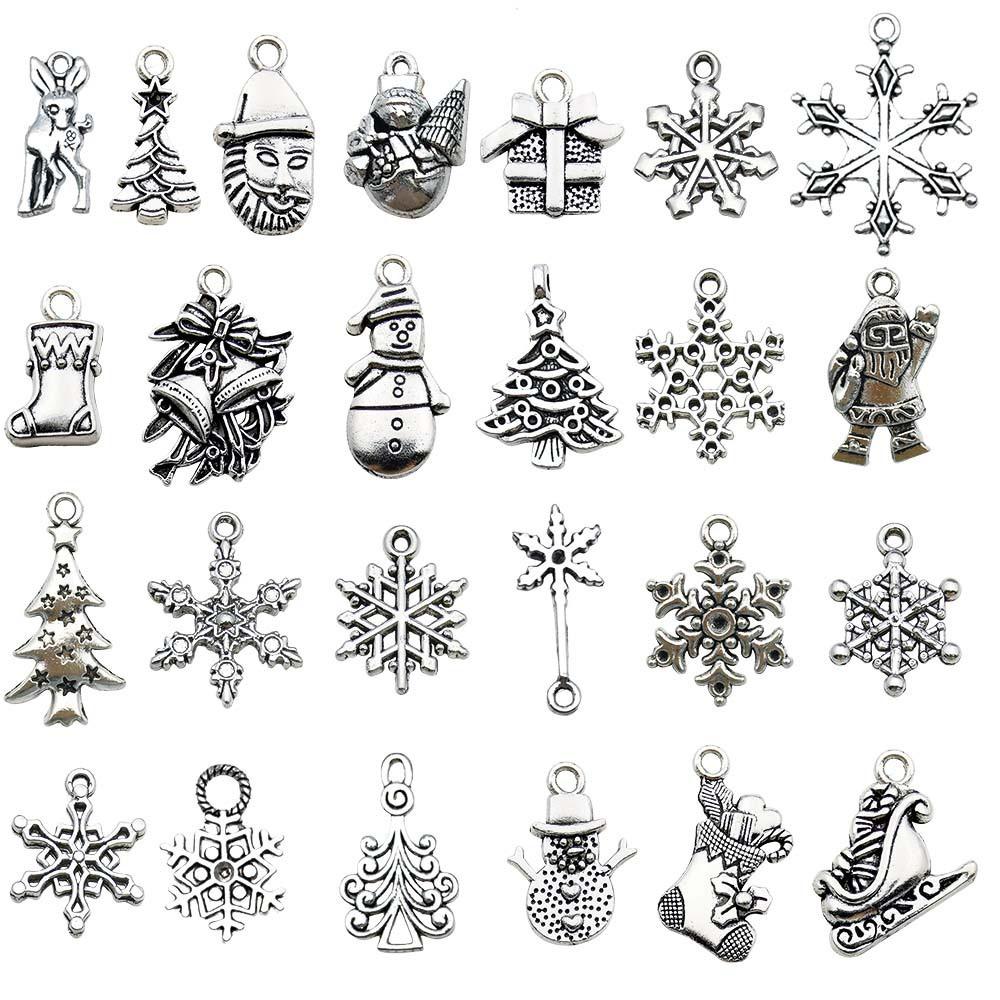 100-teiliges Weihnachts-Tropföl-Legierungs-Schmuckzubehör: Weihnachtsmann, Schneemann, Glocke, Rentier Anhänger für DIY Armbänder.