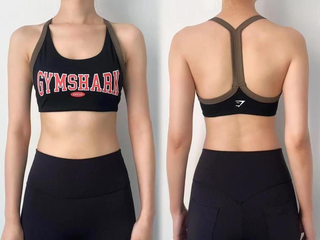 Damski biustonosz sportowy z wysokim wsparciem typu Shark Vest z zakryciem bocznym i logo, idealny do tańca i fitnessu.