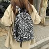 Leopard Print Backpack Casual Daily Use Trendy Street Style Lightweight Backpack for Women with Tassel Detail for School Travel and Everyday Outings