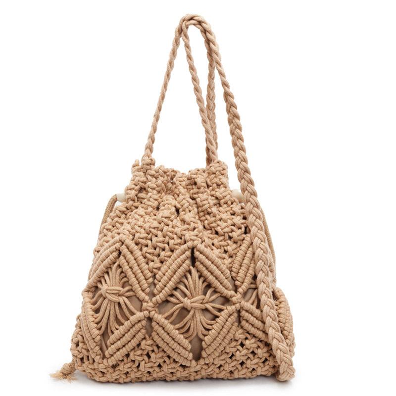 Woven straw bag women's summer versatile 2026 new fashion niche design crossbody bucket bag seaside beach bag