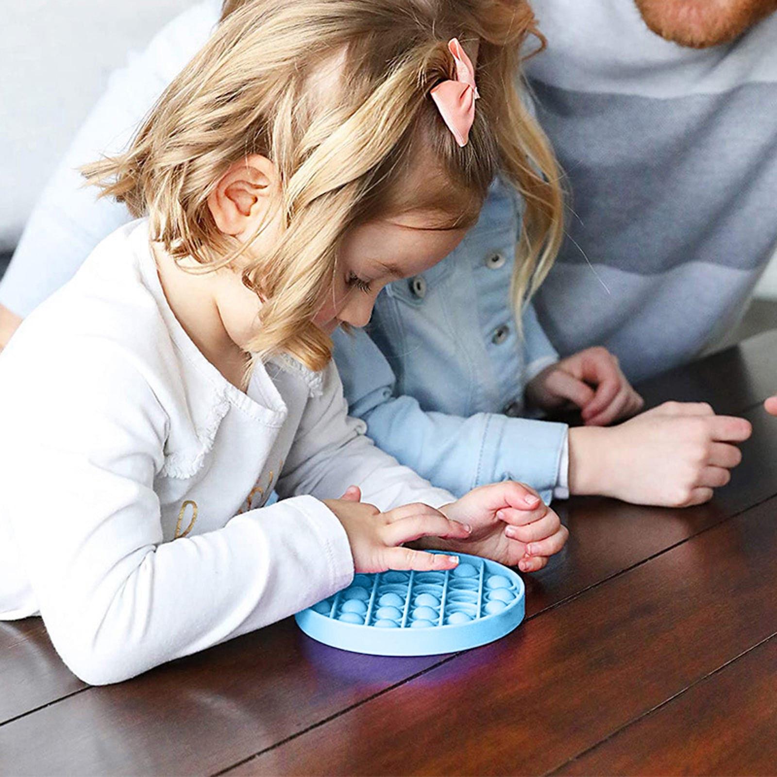 Силиконовые круглые сенсорные игрушки - антистресс Round фиолетовый — фото 6