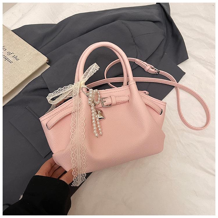 

Premium bag niche design large-capacity women s bag to work commuting texture versatile women s shoulder messenger bag No pendant розовый