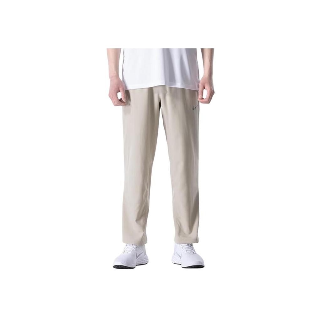 Nike Pantaloni da Allenamento Traspiranti Affusolati in Maglia da Uomo FB7498-251