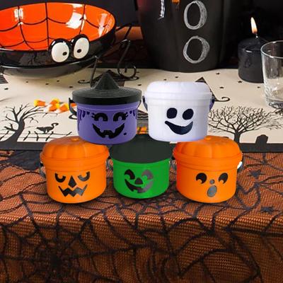 Halloweenský kbelík na sladkosti Mini držák na sladkosti Trick or Treat s rukojetí Malý dýňový kbelík s duchem pro halloweenské párty potřeby