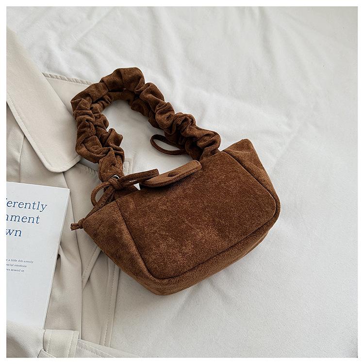 Folded portable small bag women s 2025 new Korean version niche bucket bag fashion commuter women s shoulder bag