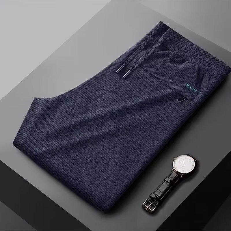 Pánské ležérní tepláky fleecové zateplené teplé jednobarevné podzimní a zimní rovné volné dlouhé tepláky