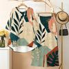 Women Plus Size White Printed Two Piece Set Round Neck Half Sleeve High Low Top Wide Leg Pants