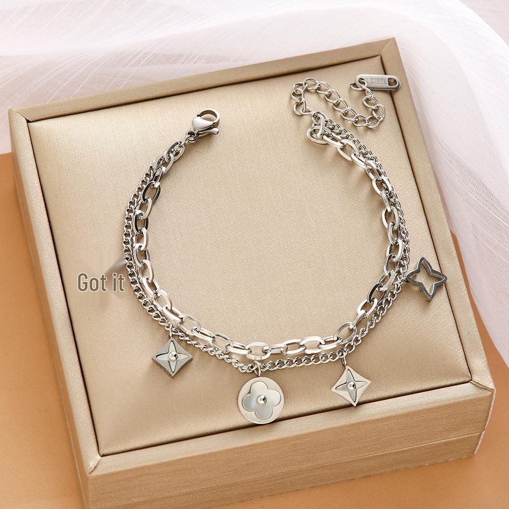 High-End Titanium Steel Four-Leaf Clover Bracelet with Shell Pendant – Durable, Fade-Resistant Design