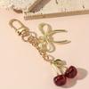 1pc Unisex Red Cherry Shaped Keychain With Fashionable Bow Pendant, Luxury Handbag Key Ring Accessory For Mother's Day Eid al Ad