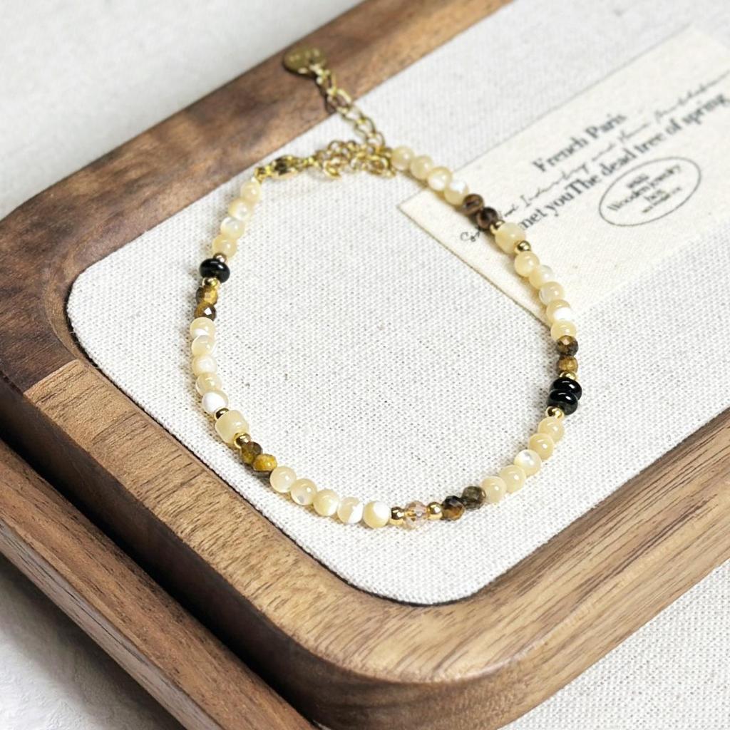 Tigeröga Snäckskal & Fröpärlor Armband - Nischad Design