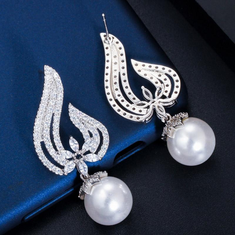 

CMM уникальный серебряный цвет полый дизайн серьги с подвеской из искусственного жемчуга для женщин