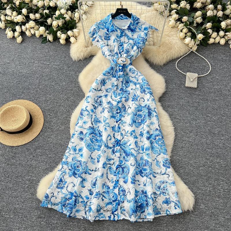 

Высококлассное и элегантное женское платье с приталенной талией, лацканом и ажурным вязаным узором XL синий