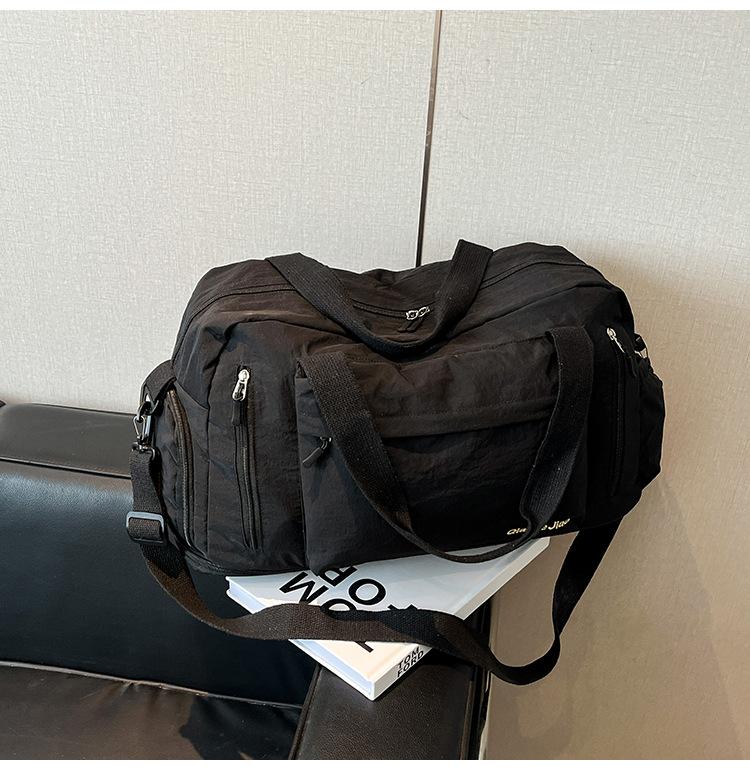 

Casual large-capacity bag women s new business travel bag casual and lightweight fitness yoga bag portable messenger bag tide чёрный