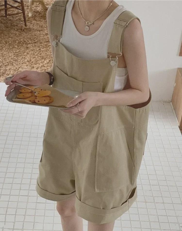 Dámské khaki bavlněné zeštíhlující volné overaly s velkými kapsami - Letní široké šortky na ramínka
