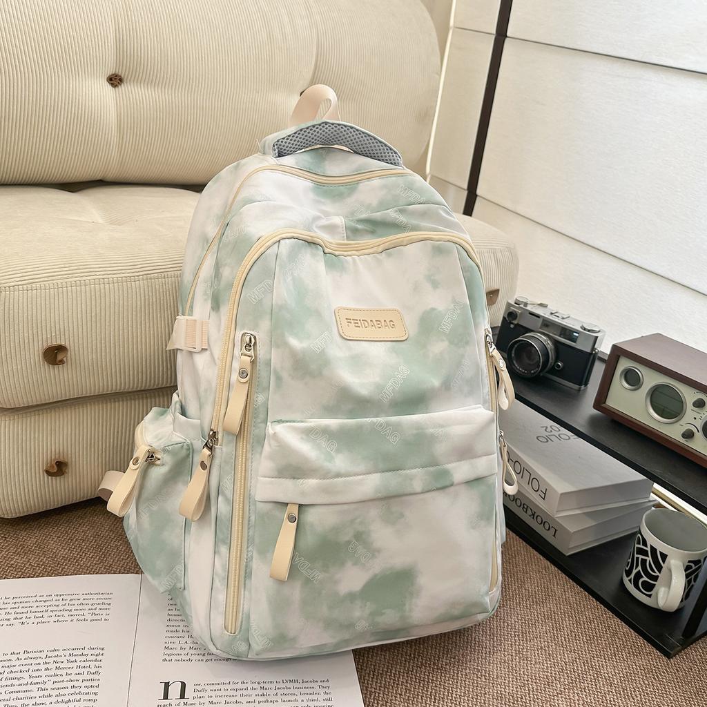 Schoolbag new niche design tie-dye schoolbag female junior high school student lightweight backpack college student leisure travel printed backpack