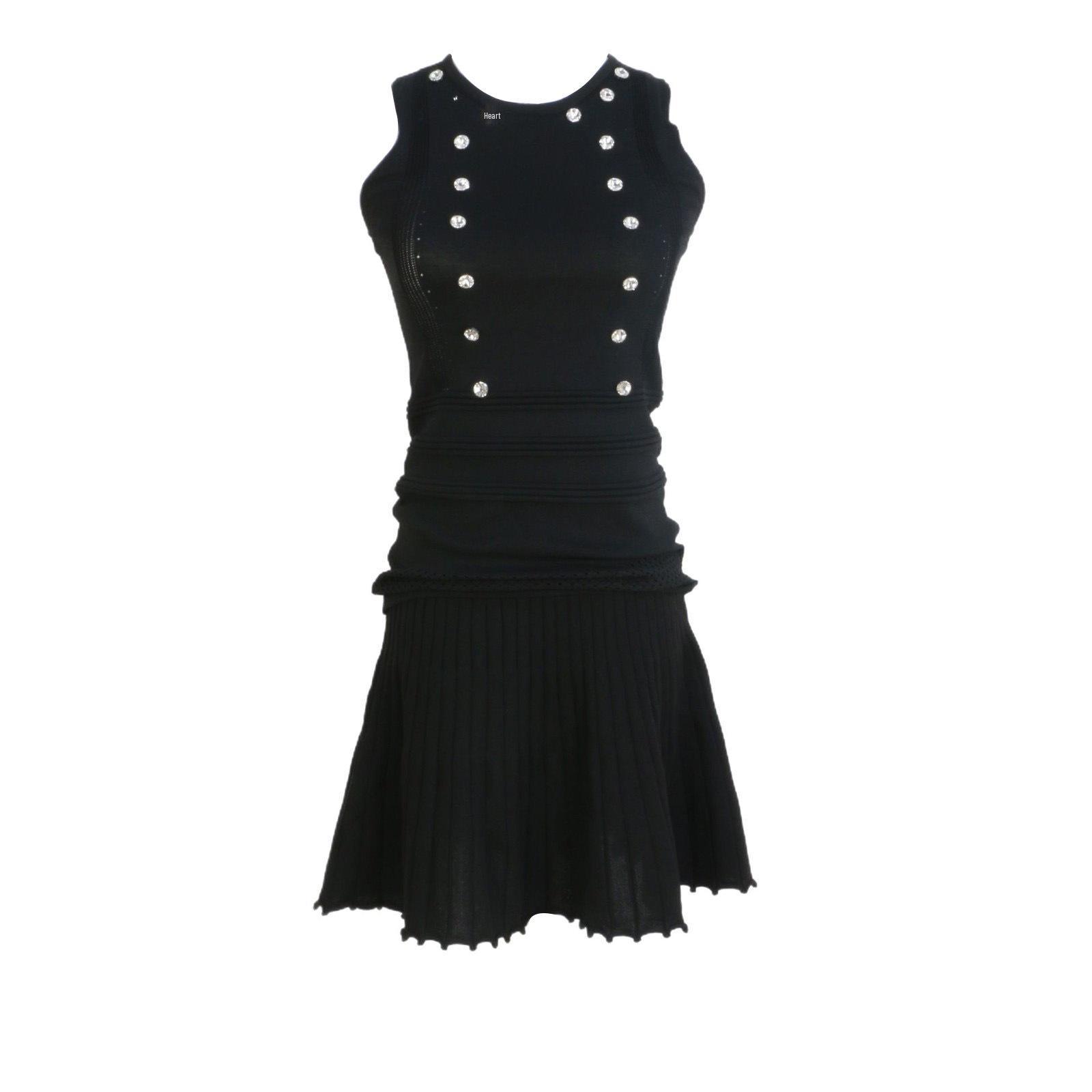 

Slimming Sleeveless Sheath Dress & Pleated Knit Skirt Set Small