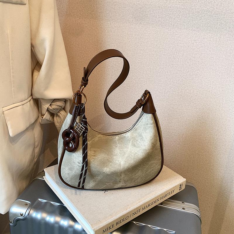 

2025 autumn new armpit bag women s Korean niche shoulder bag foreign style messenger bag casual commuter shoulder bag no pendant хакі