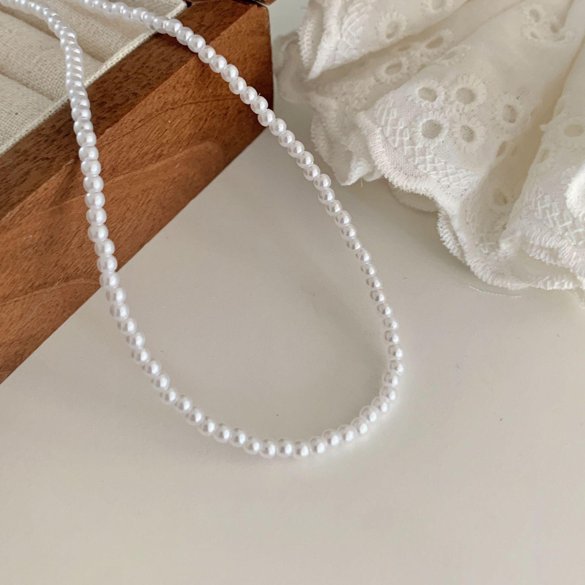 Exquisite Women s Imitation Pearl Pendant Necklace - Light Luxury Layered Clavicle Chain with Millet Beads