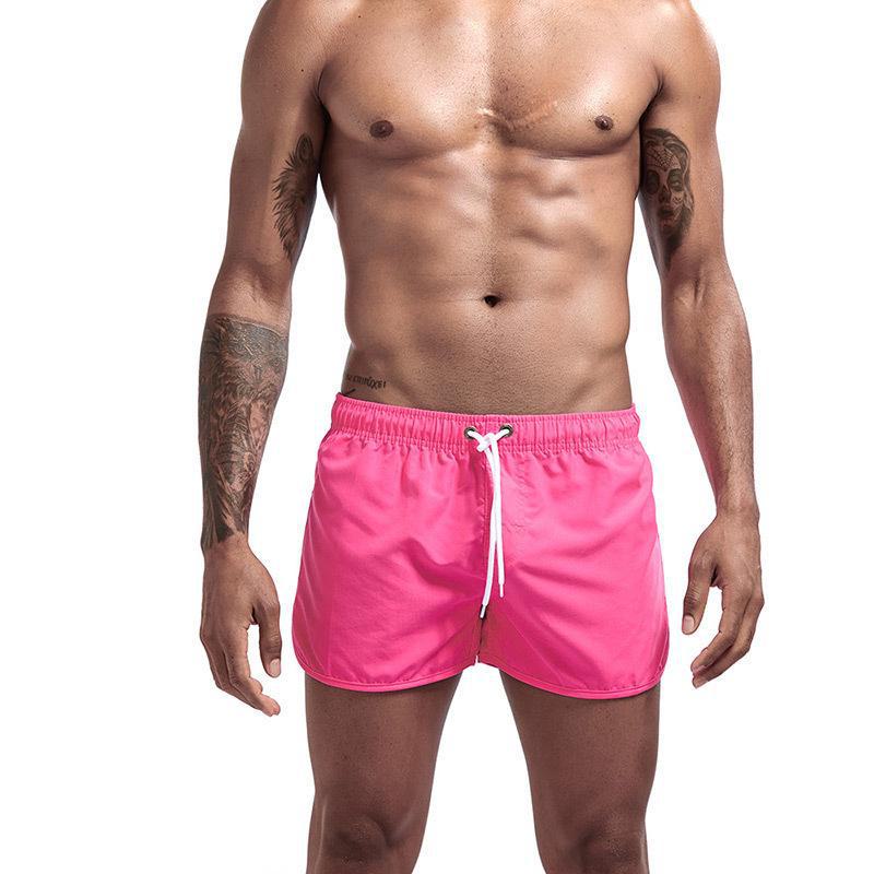 

2026 Men s European and American Solid Color Beach Shorts - Fashionable, Loose Fit Sports Shorts with Drawstring. S розовый
