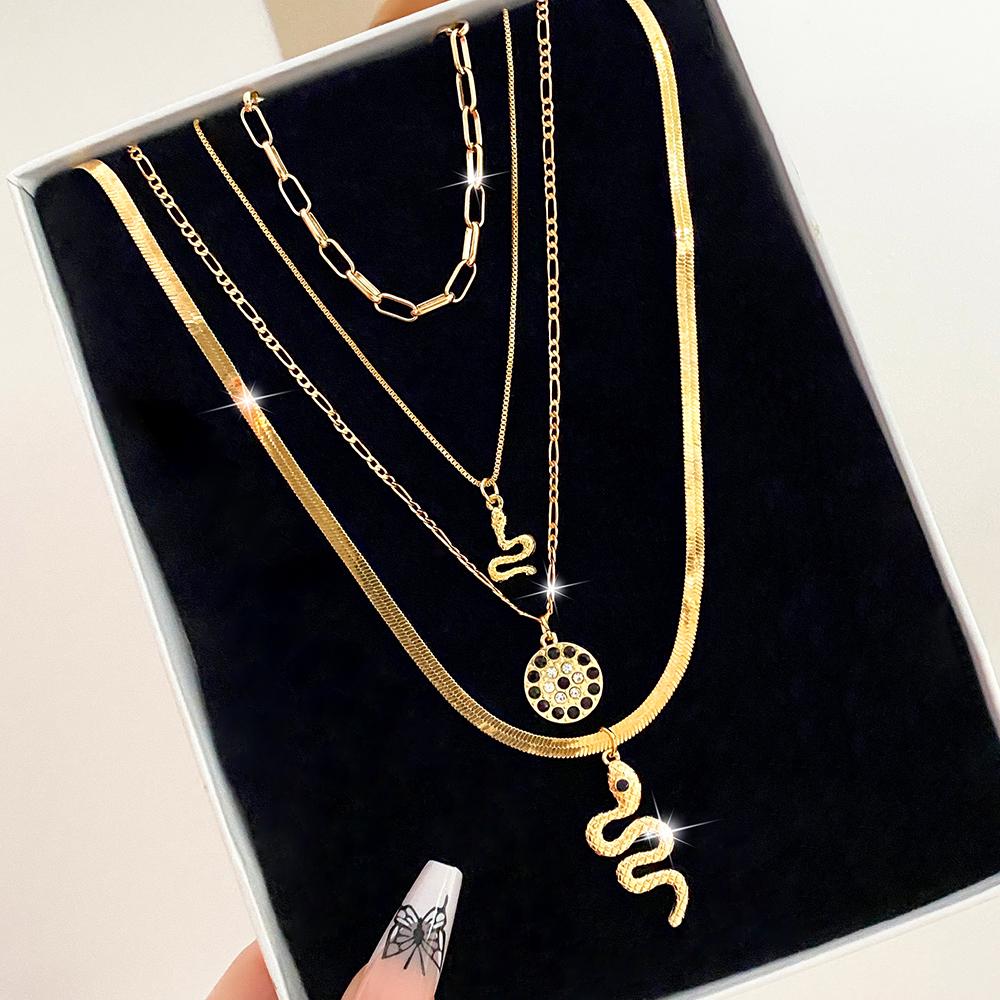 Four Piece Snake Necklace Women's Fashion Hollow Out Necklace Personality Bohemian Sweater Chain Elegant Snake Pendant