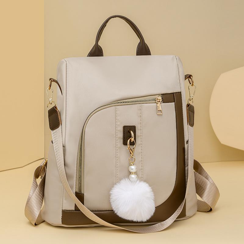 Backpack women's new simple contrasting color commuter casual backpack large capacity anti-theft women's travel bag