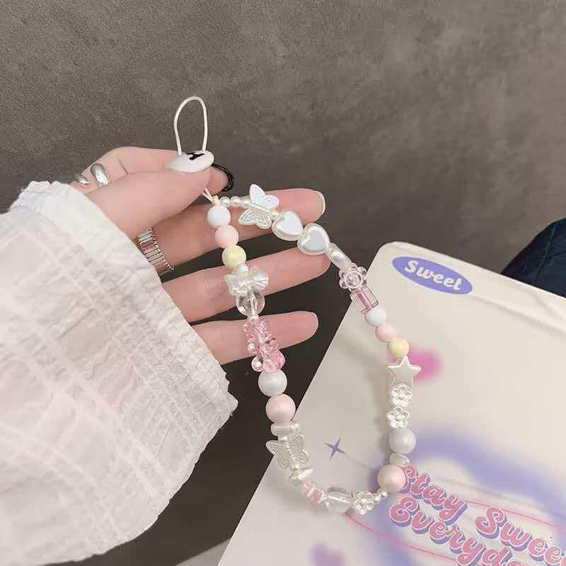 Perlenbesticktes Herzschleifen-Handy-Lanyard