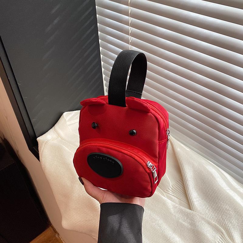 Three-color patch small bag female new dog change handbag cartoon cute student hand mobile phone bag versatile