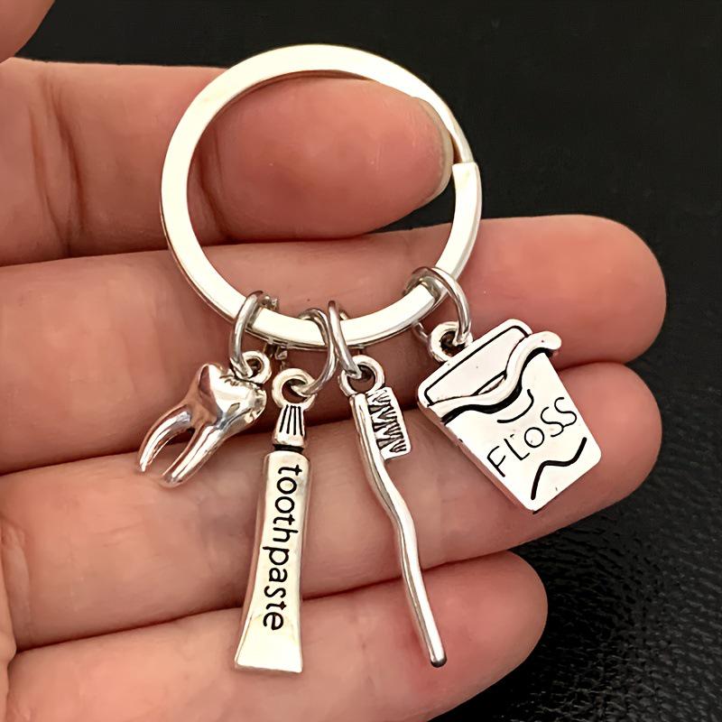 European and American Style Dental Care Keychain with Toothbrush, Toothpaste, and Floss - Creative Backpack Pendant Gift
