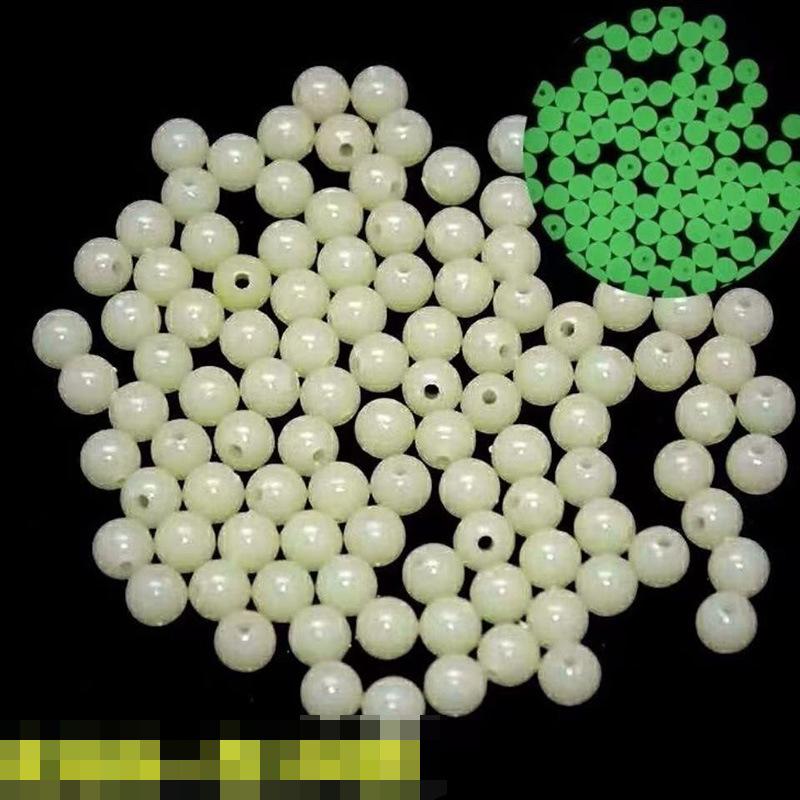 Leuchtende Angelhaken mit leuchtenden Perlen