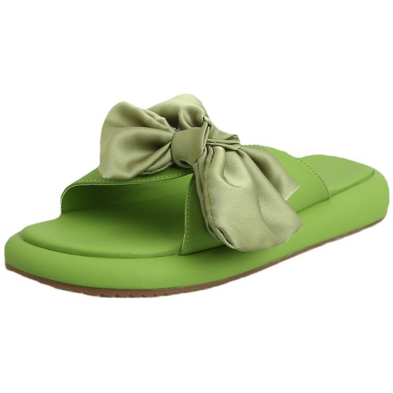 Soft-soled shit-stepping bow flat-soled sandals, new thick-soled women's cool slippers for women's summer wear in the summer of 2025