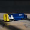 Takara Tomy Tomica No. 135 Michelin Motorsport Transporter Miniature Car Toy for Ages 3 and Up