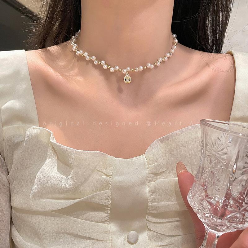 Pearl camellia necklace women's new high-end collarbone chain versatile celebrity neck chain tide