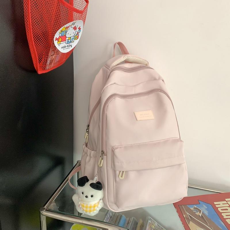 Solid color female Harajuku backpack, campus style, junior high school, high school student schoolbag, female simple large-capacity backpack