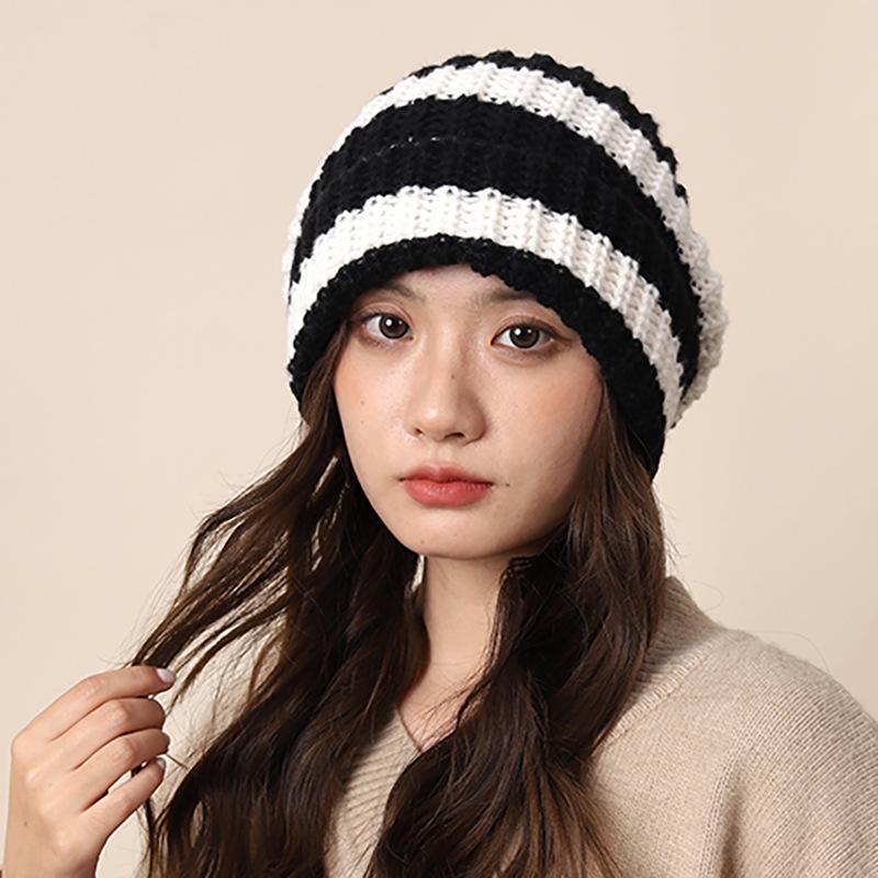 Pile hats autumn and winter lazy wind color matching coarse knitted wool hats women's cold hats men's big head circumference showing small face