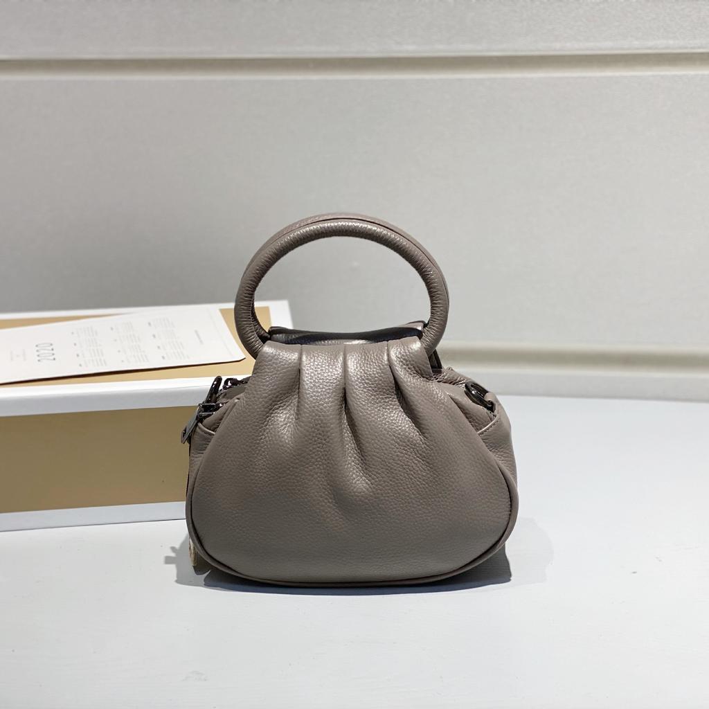 Bolsa Feminina de Couro Genuíno 2025 Nova Retrô Couro Bovino Camada Superior Bolsa de Mão Simples Versátil Tote Fabricante