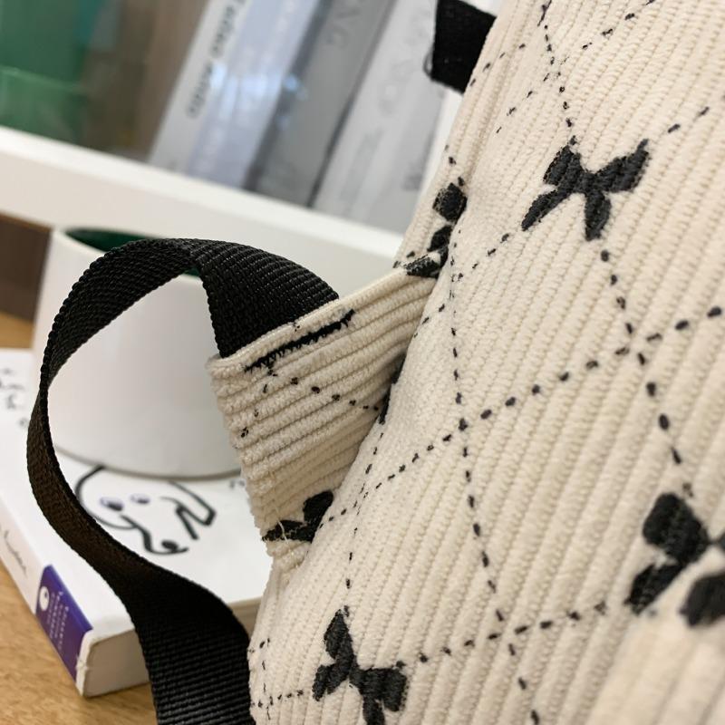 Bow Print Corduroy Backpack Casual Fashion Daily Bag Large Capacity School Bag for Students Minimalist Design Commute Travel with Tassel Accents