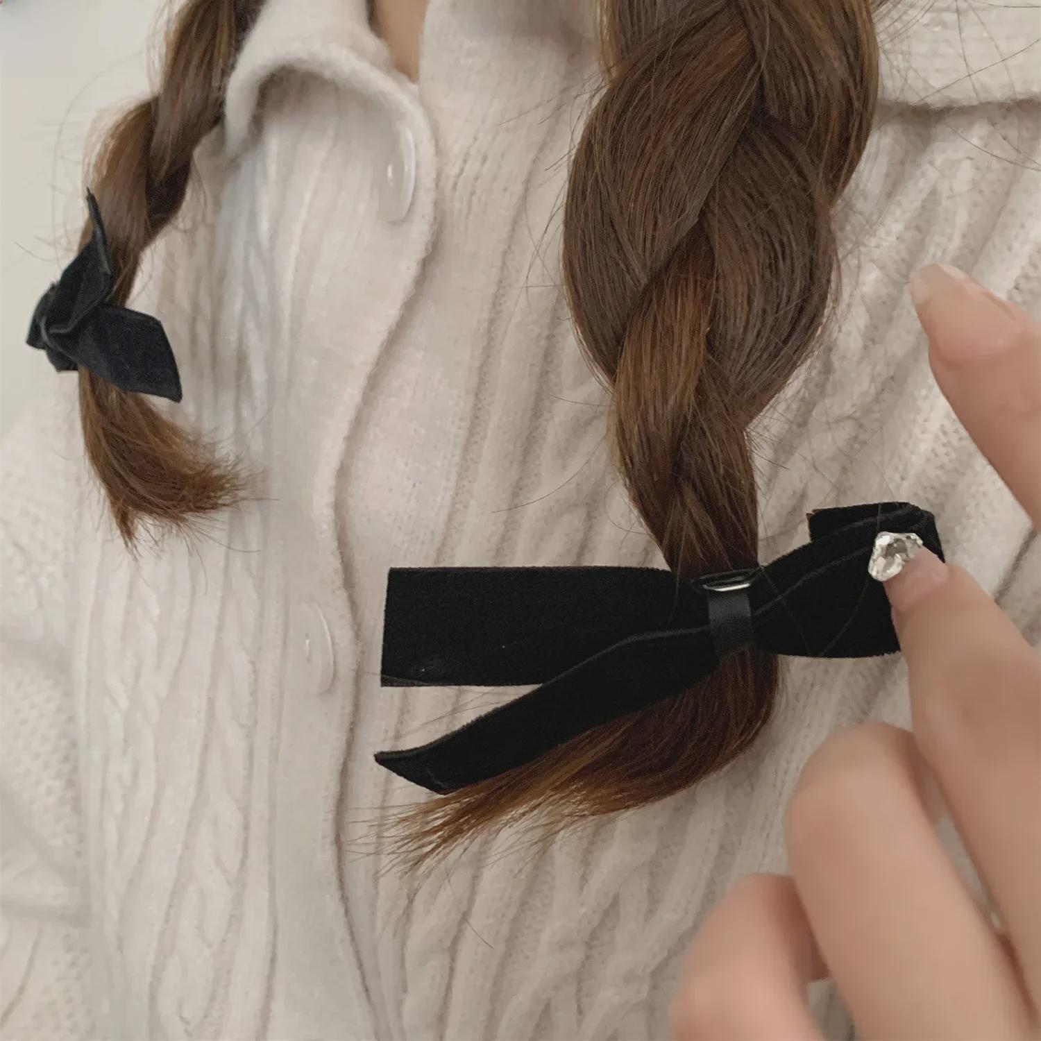 

Korean Black Velvet Bow Hairpin for Bangs – Elegant French-Inspired Hair Accessory