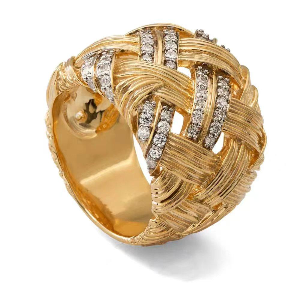 Retro woven and set with artificial gemstones ring made of copper. Women's jewelry ring suitable for formal events.