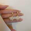 French White Petal Flower Clip On Earrings Simple Elegant Non Pierced Ear Clips For Women And Girls