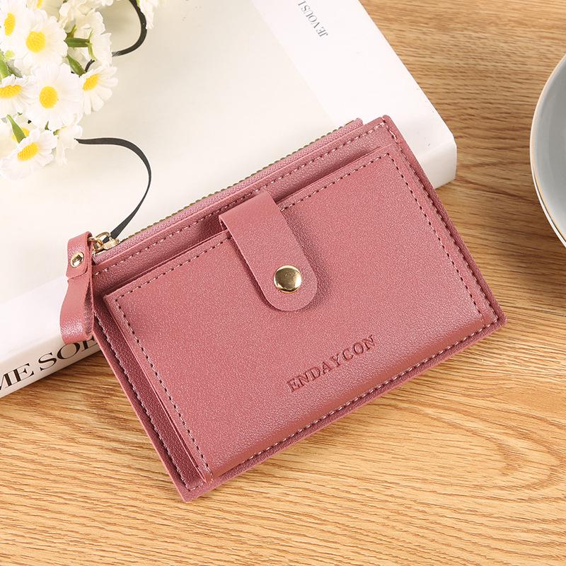 

Ультратонкий женский кожаный кошелек с отделениями для карт и застежкой-молнией – Большая вместимость, однотонный дизайн темно-розовый