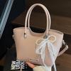 Korean version of the trend hand-carried bucket bag women's summer 2025 new simple fashion versatile shoulder bag niche high sense