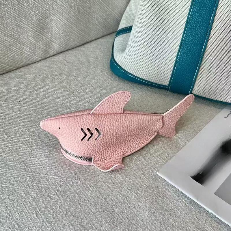 New leather dolphin change bag, keychain pendant, cute fashion earphones, lipstick storage bag.