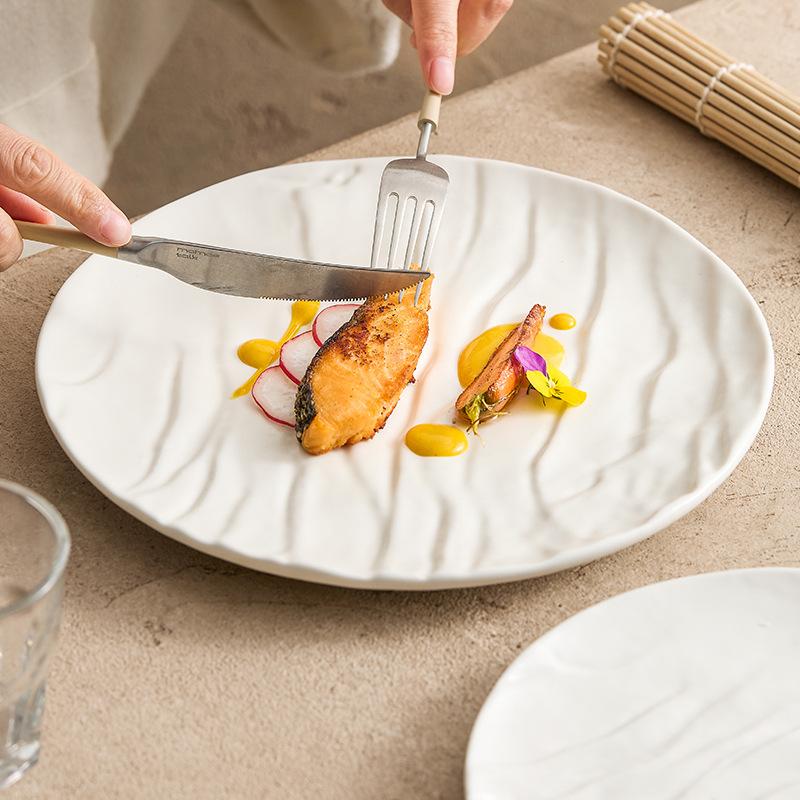 Matte corrugated ceramic western-style dishes steak dishes high-grade light luxury artistic conception dishes round plates.