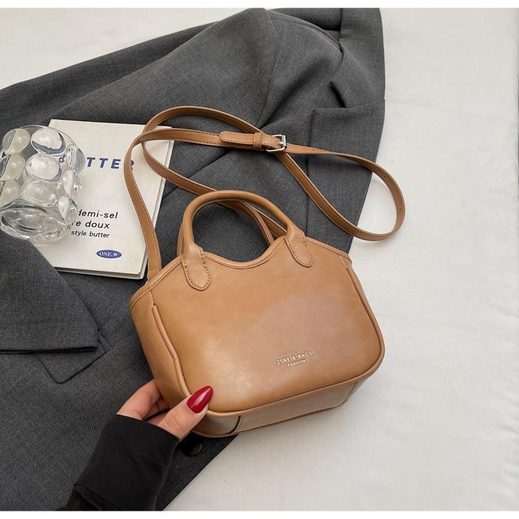 

Wholesale 2025 new bag women go out with simple and cute texture pendant portable commuter messenger small square bag