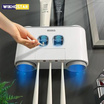 Dispensador automático de pasta de dientes, juego de accesorios de baño, juego de soporte para cepillos de dientes con 4 tazas, exprimidor de pasta de dientes, estante de almacenamiento para cepillos de dientes